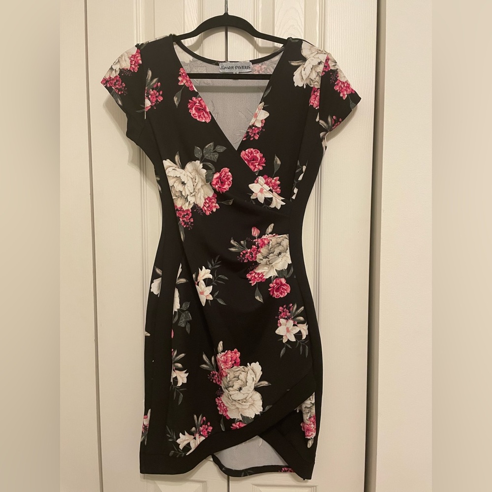 NWOT Almost Famous floral dress.  Never worn.  Size is Medium.